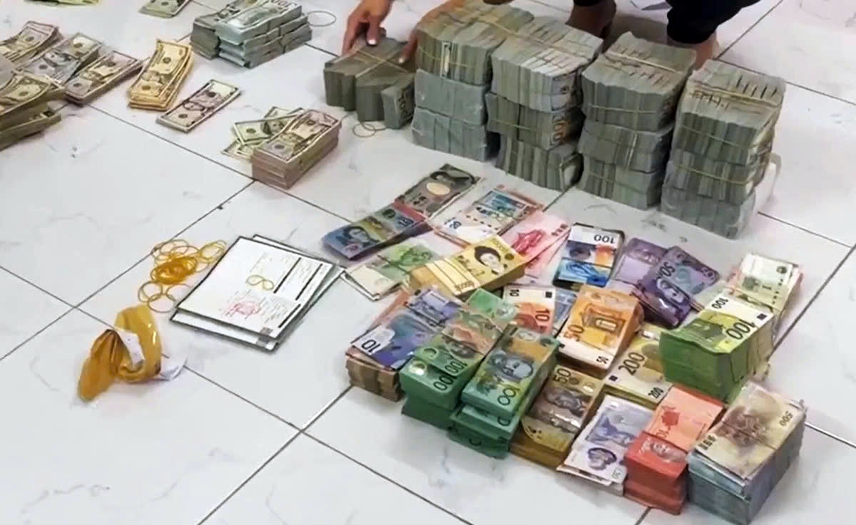 City court sentences 19 in major cross-border money laundering ring